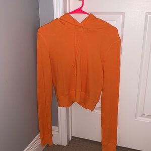 Cropped orange long sleeve